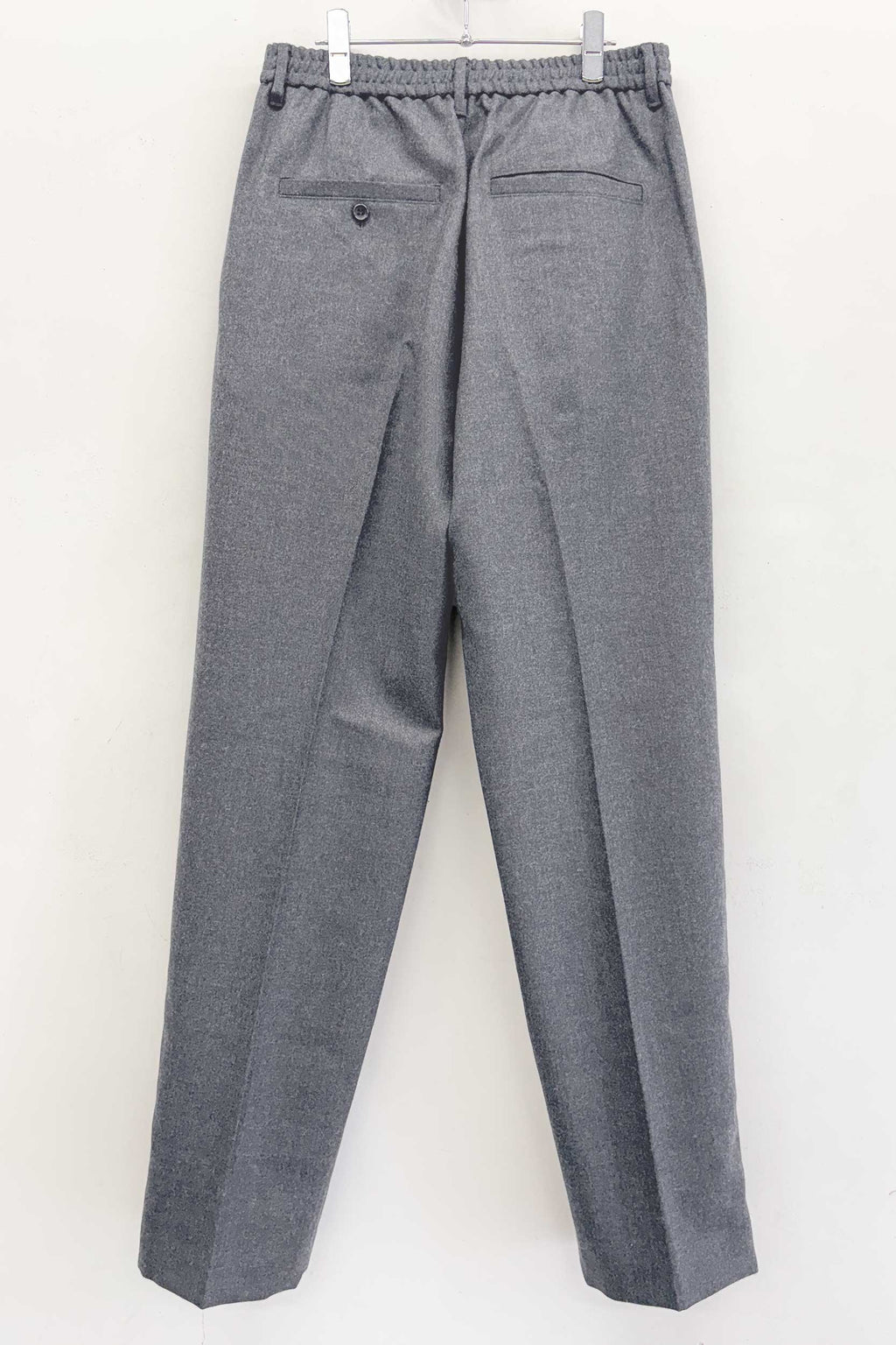 【NEW】　WOOL SERGE PLEATED HEM ZIP TROUSERS