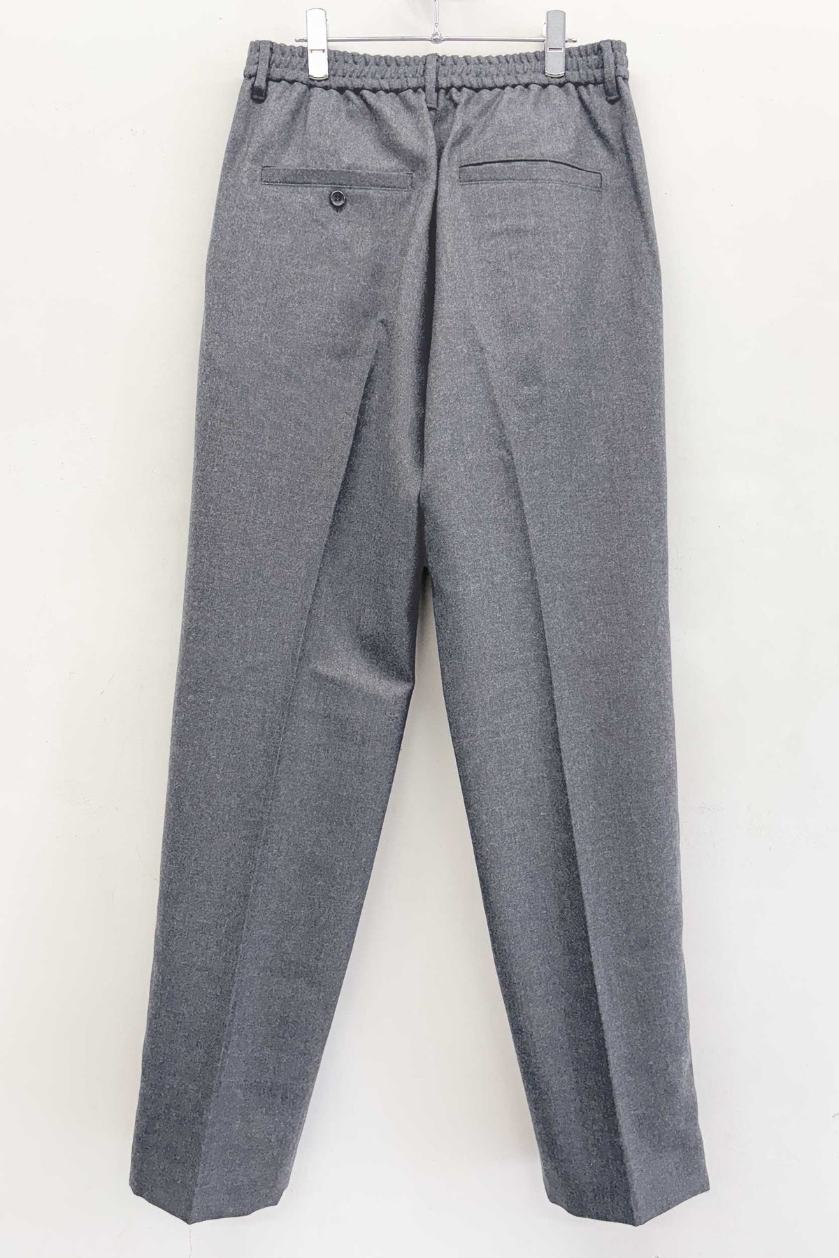 【NEW】　WOOL SERGE PLEATED HEM ZIP TROUSERS
