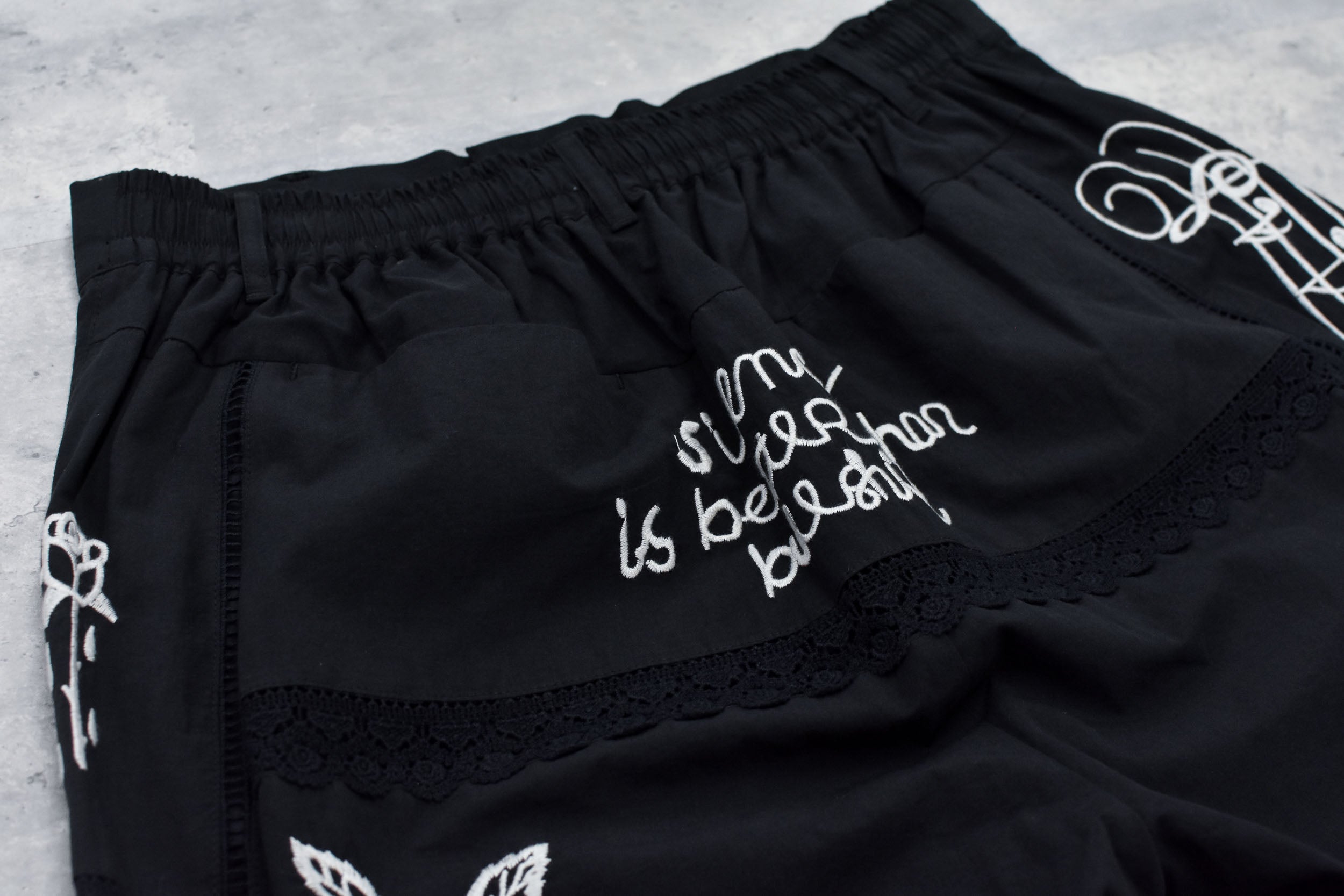 Ladder Race×Embroidery Pants