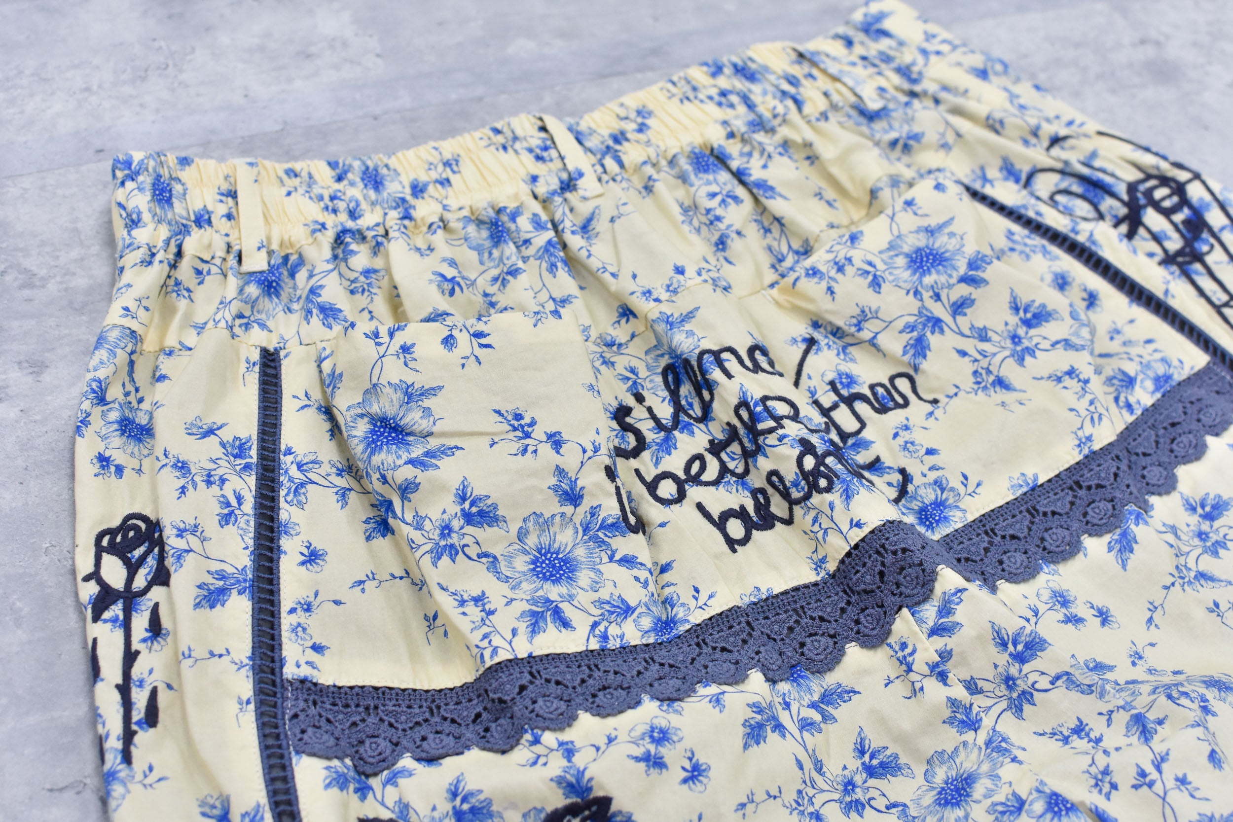 Ladder Race×Embroidery Pants