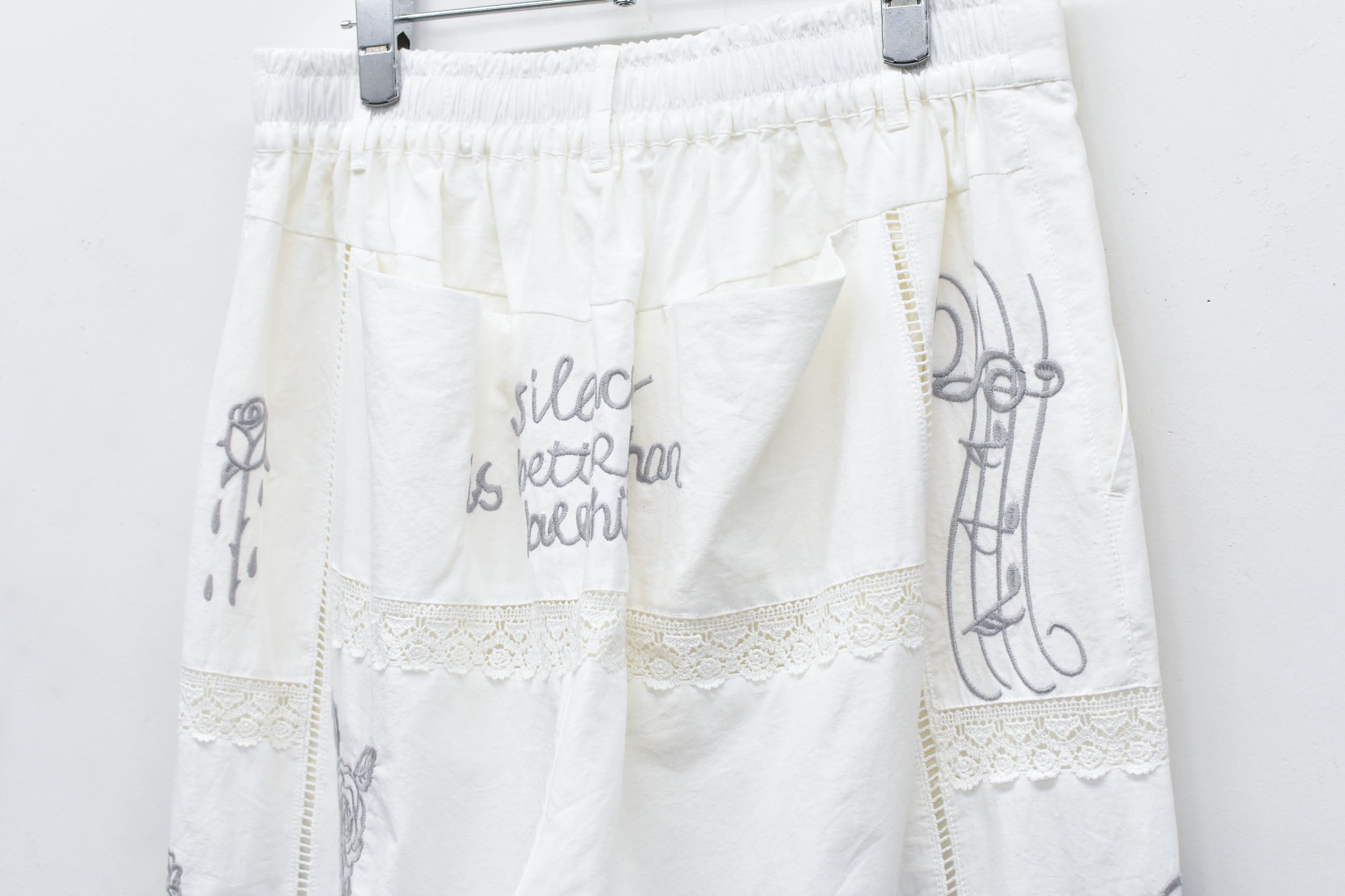 Ladder Race×Embroidery Pants