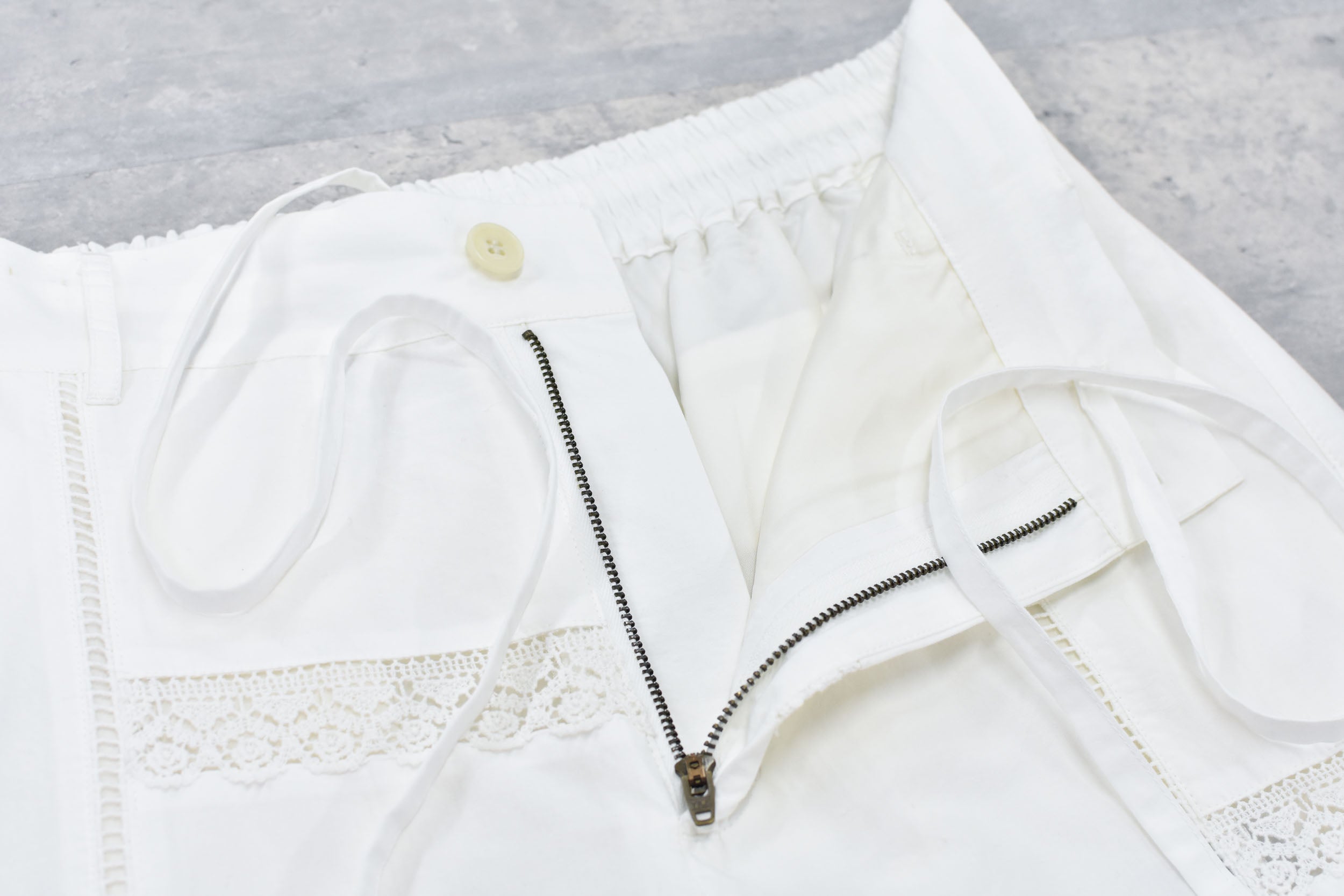 Ladder Race×Embroidery Pants