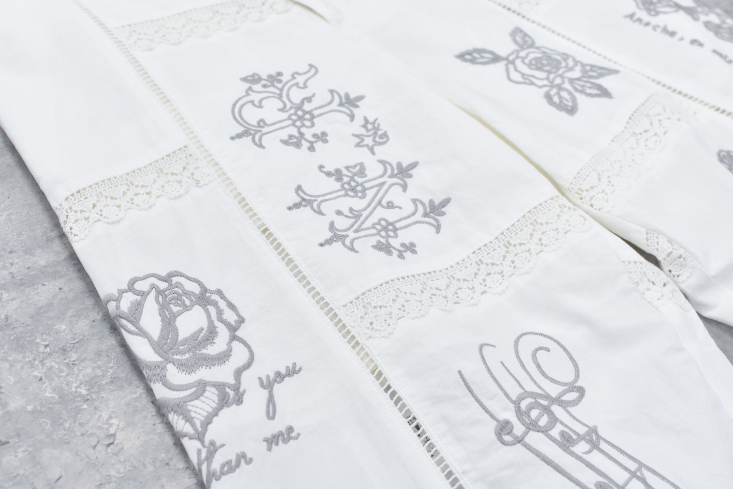 Ladder Race×Embroidery Pants
