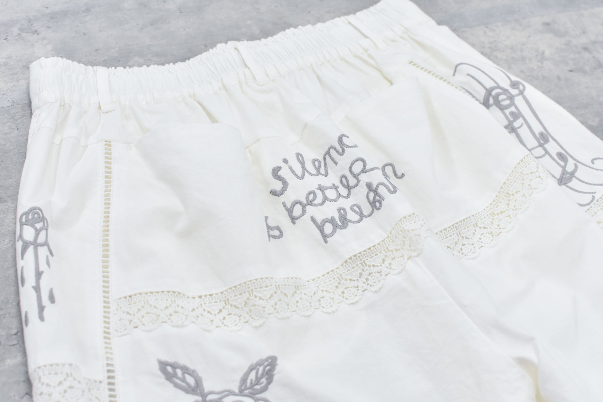 Ladder Race×Embroidery Pants
